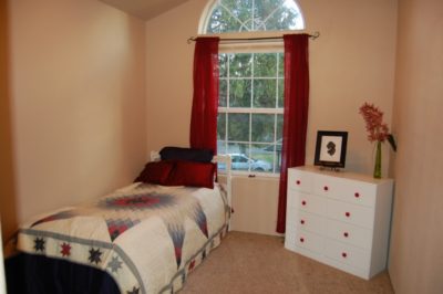 Cluttered disorganized bedroom