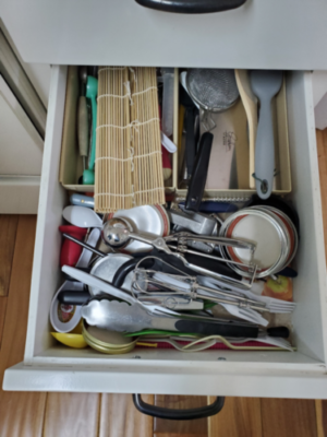Messy kitchen drawer